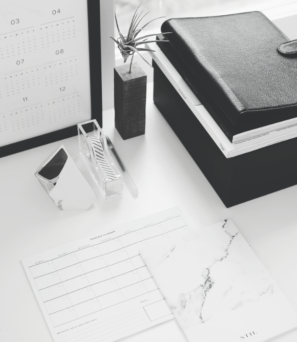 A desk with office supplies